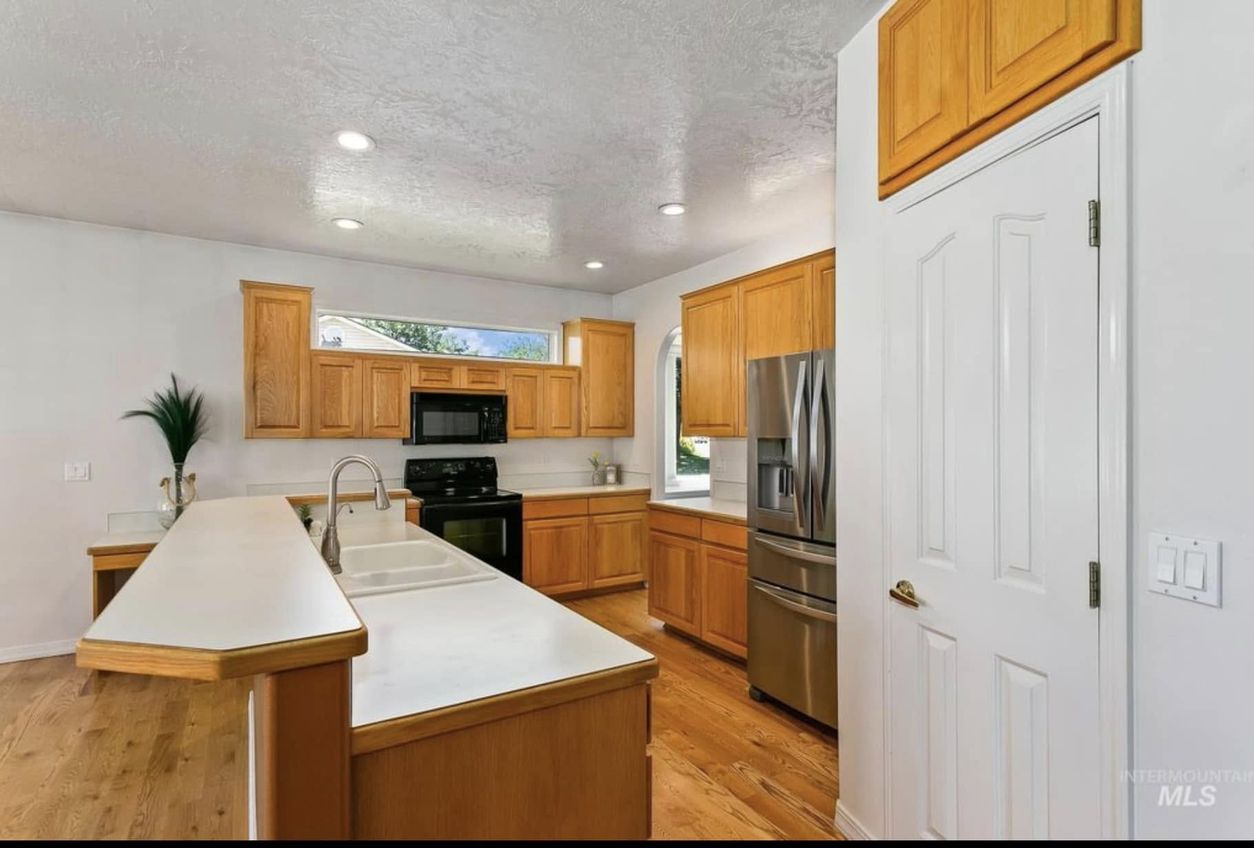 Before: original oak cabinetry